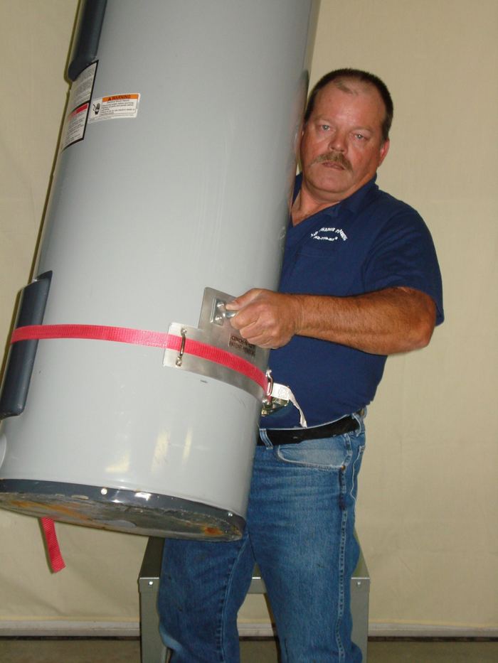 Lifting and carrying the tilted water heater